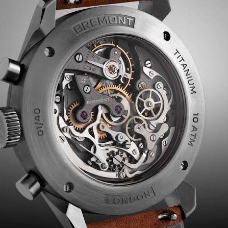 Bremont display caseback with engraved exterior markings and a visible mechanical movement